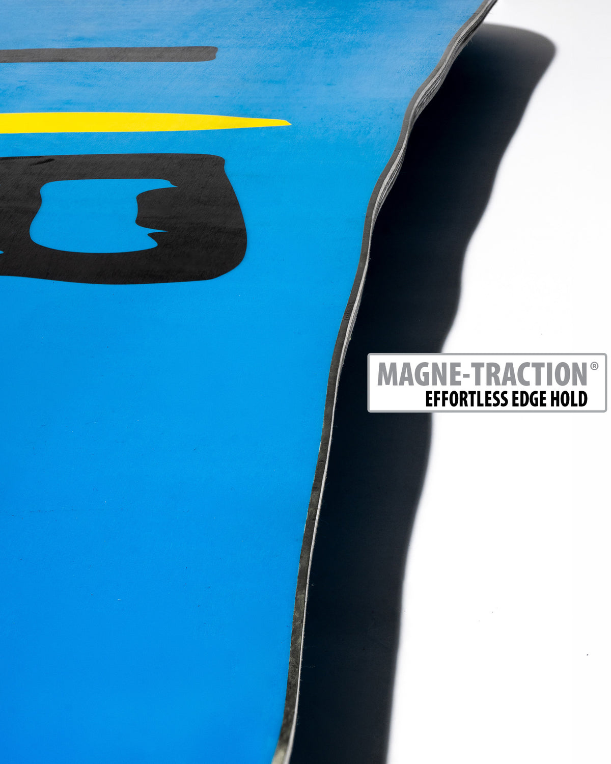 Lib Tech Skate Banana snowboard base close-up showing Magne-Traction serrated edge technology