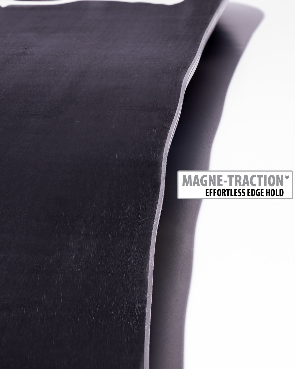 Lib Tech Skunk Ape Camber snowboard base close-up showing Magne-Traction serrated edge technology