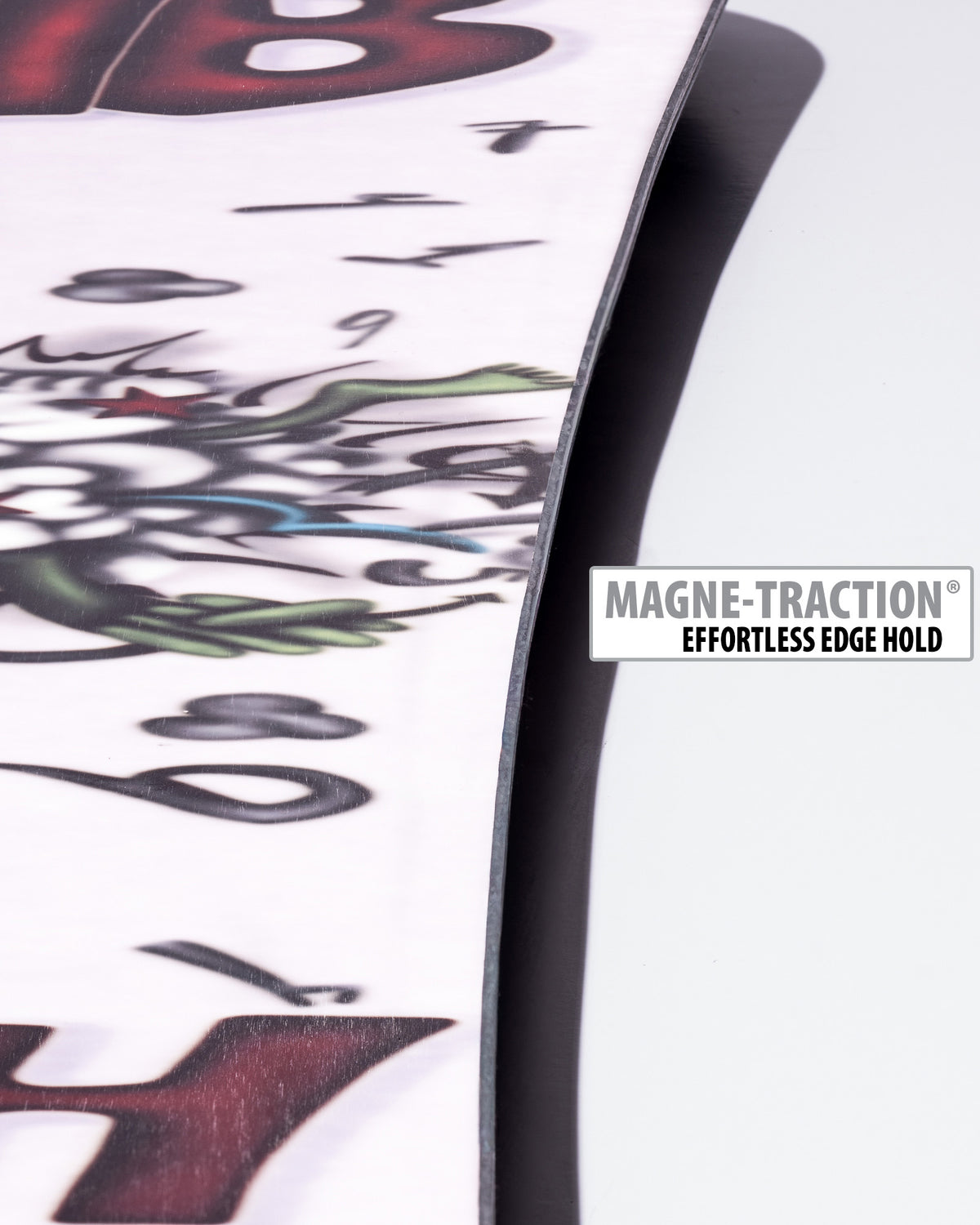 Lib Tech Two Time snowboard base close-up showing Magne-Traction serrated edge technology